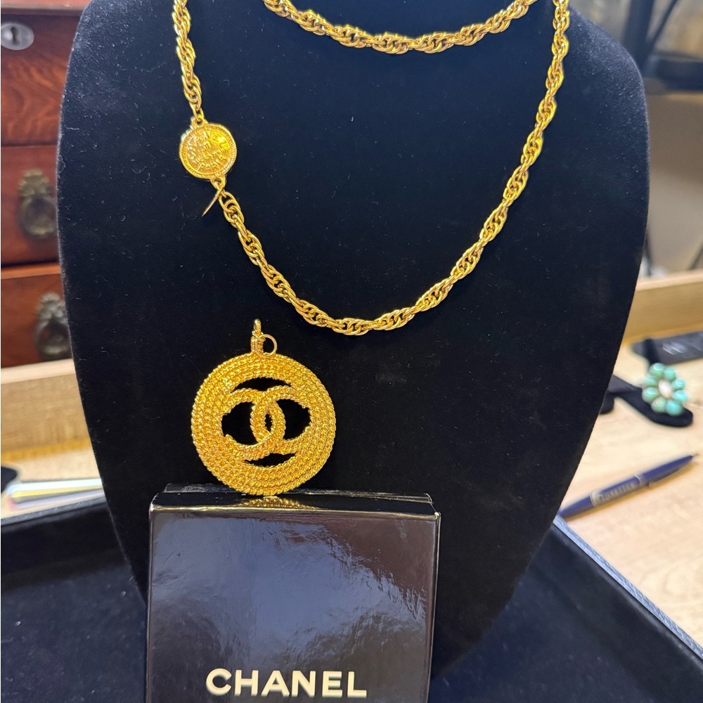 VINTAGE CHANEL MEDALLION AND VINTAGE 35” CHANEL TWISTED COIN NECKLACE (2pc set)